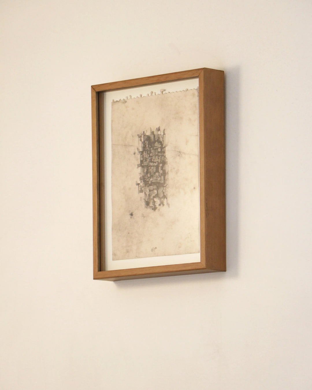 Framed artwork on a beige wall